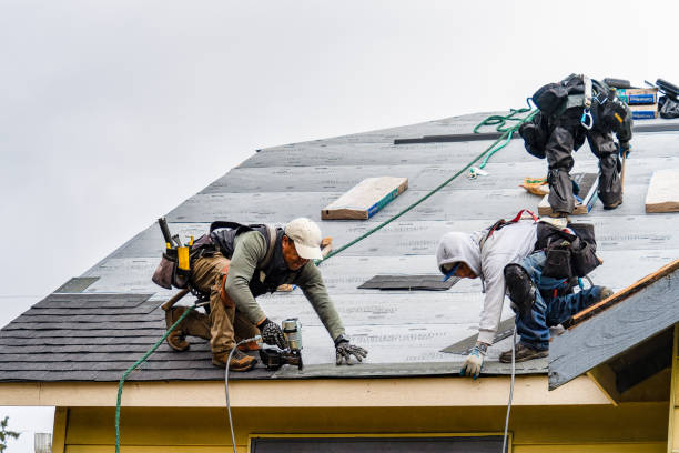Professional Roofing technician working in Hope, IN